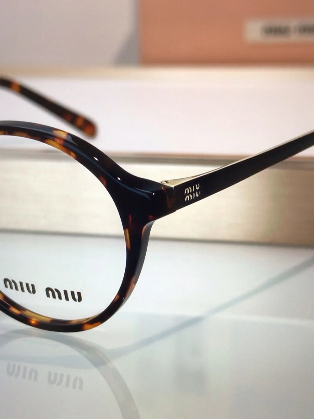 Miu Miu rounded miu tortoiseshell